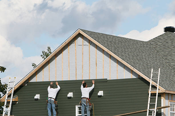 Professional Emergency Siding Repair technician working in Tobaccoville, NC